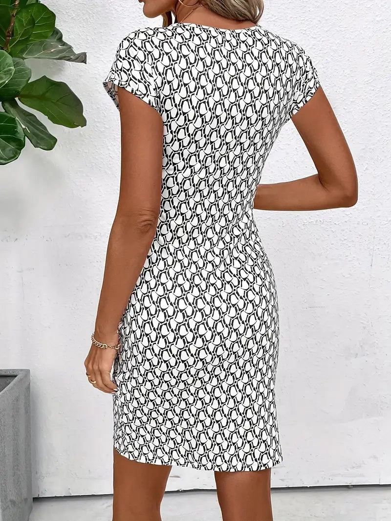 Riley – elegantes kleid mit rundhalsausschnitt und allover-print